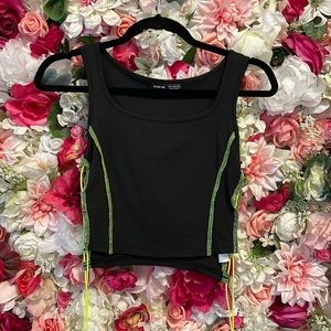 BLACK TOP WITH NEON GREEN DETAILS SIDE CUT OUT